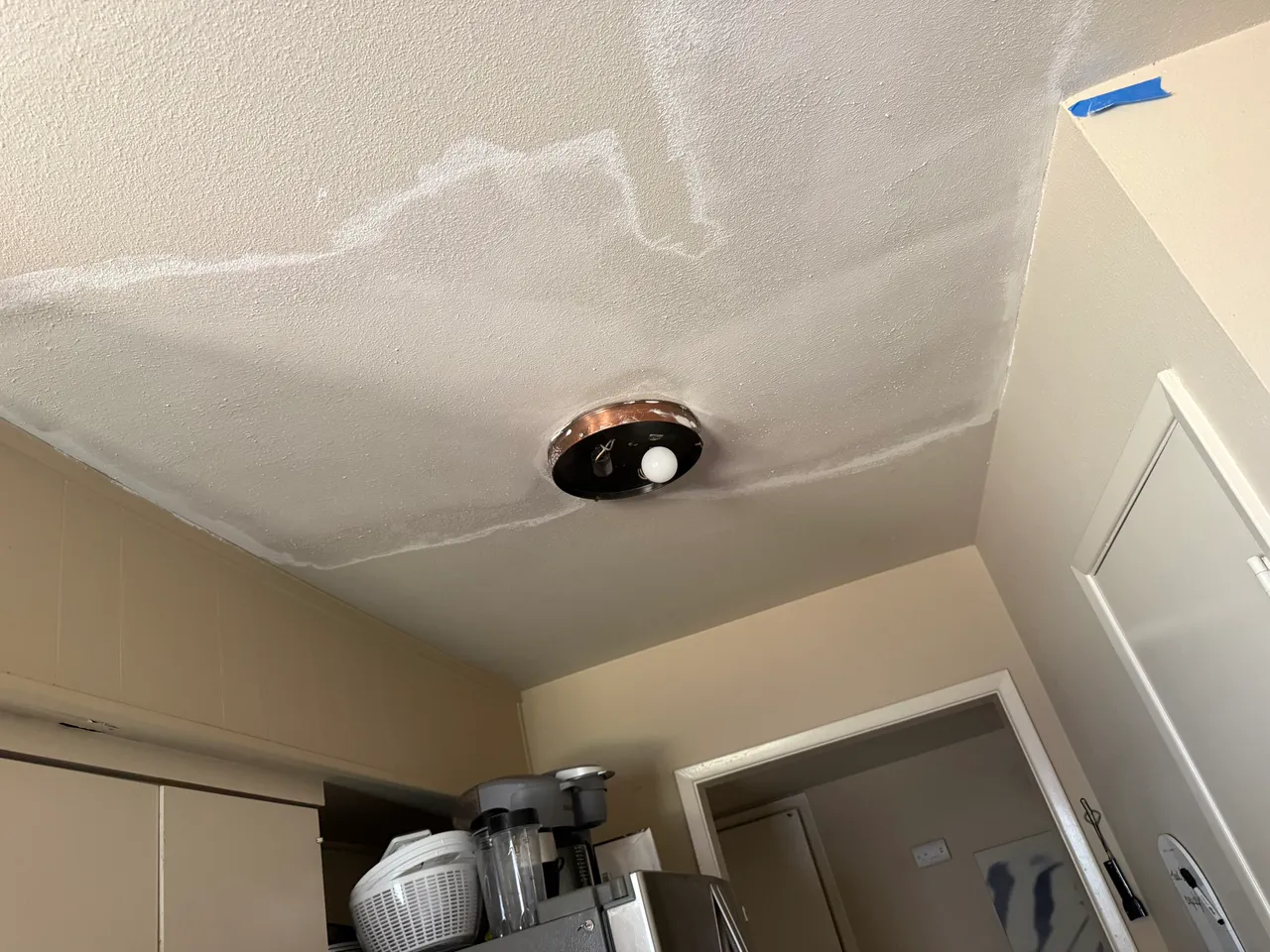 Ceiling drywall repair with texture matching in progress in Richardson, TX